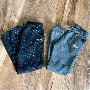 2 pairs of girls sweat pants.